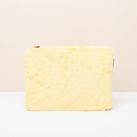 La Trousse fourrure jaune Pomponne