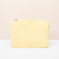 La Trousse fourrure jaune Pomponne